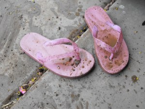 muddy flip flops